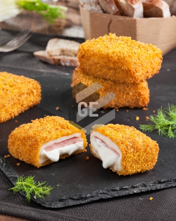 Mini fried mozzarella sandwich with ham